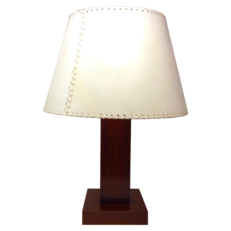Lampada in palissandro e pergamena Table lamp in rosewood and parchment